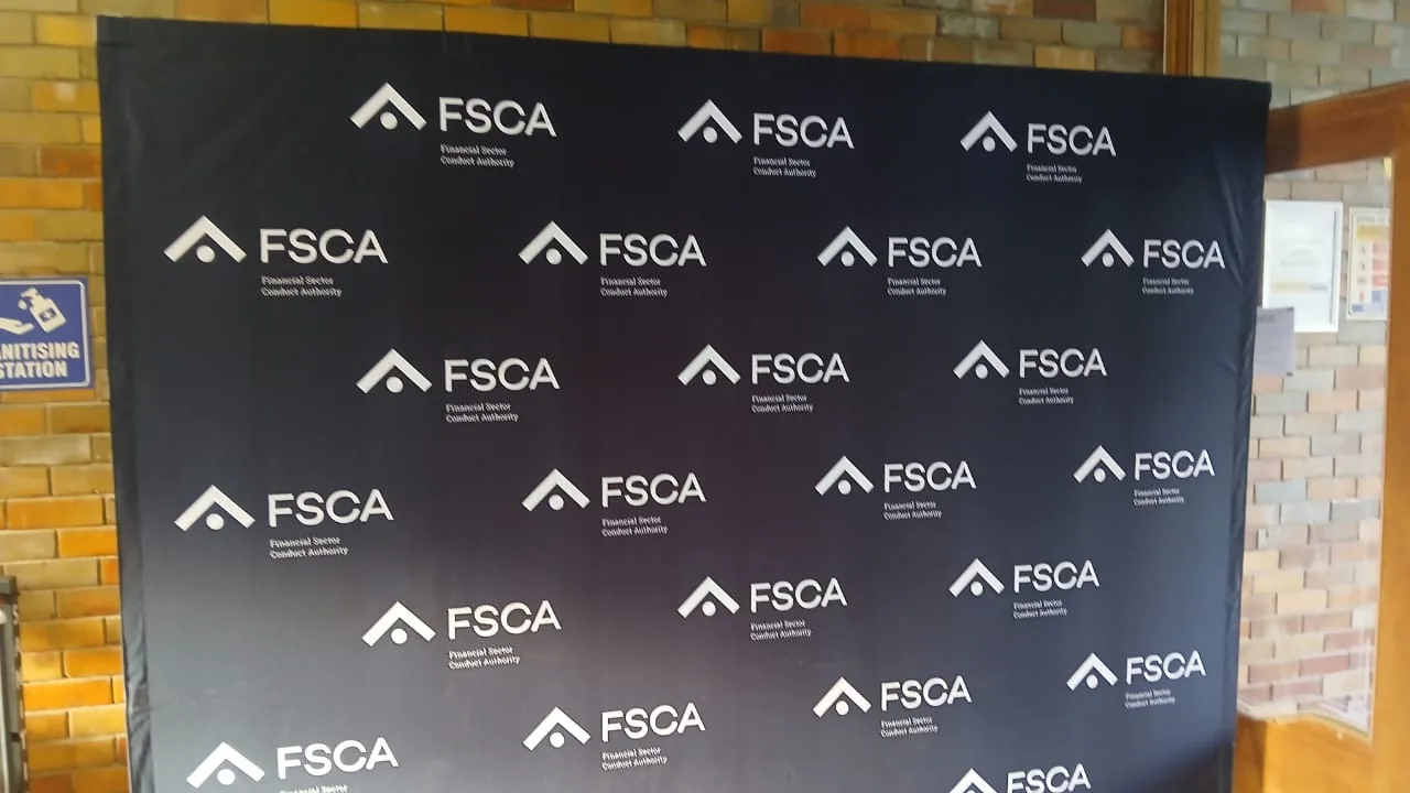 FSCA branded media wall installed at the NEET workshop venue