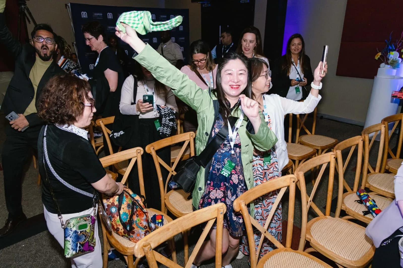 International delegates celebrating during the Speed Marketing Session