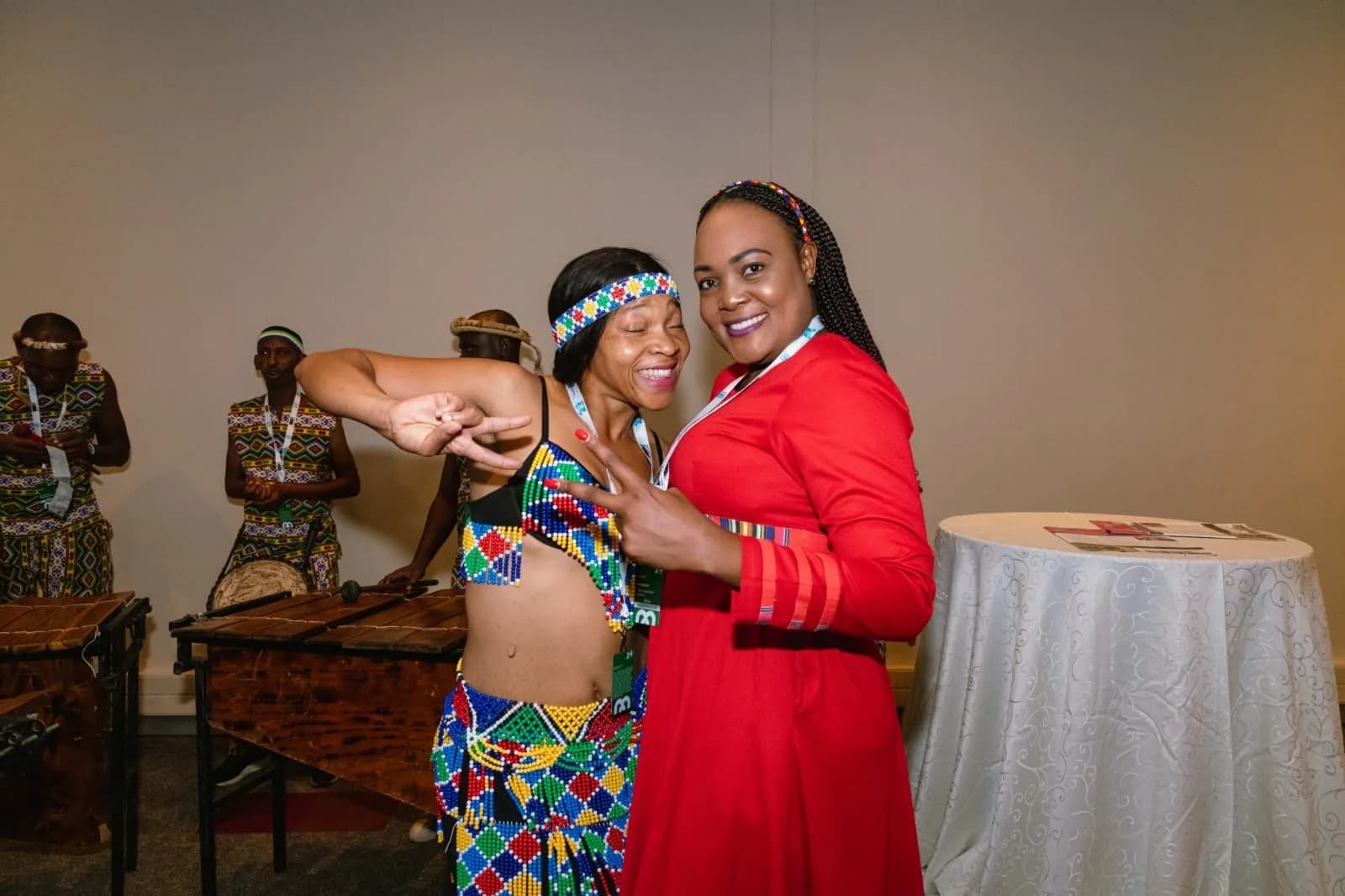 Delegate with a traditional dancer and marimba band at Meetings Africa 2026