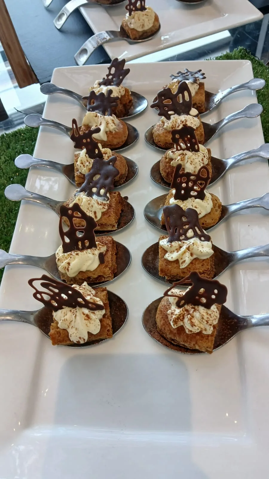 Canape desserts plated on spoons for delegates at the National Language Summit