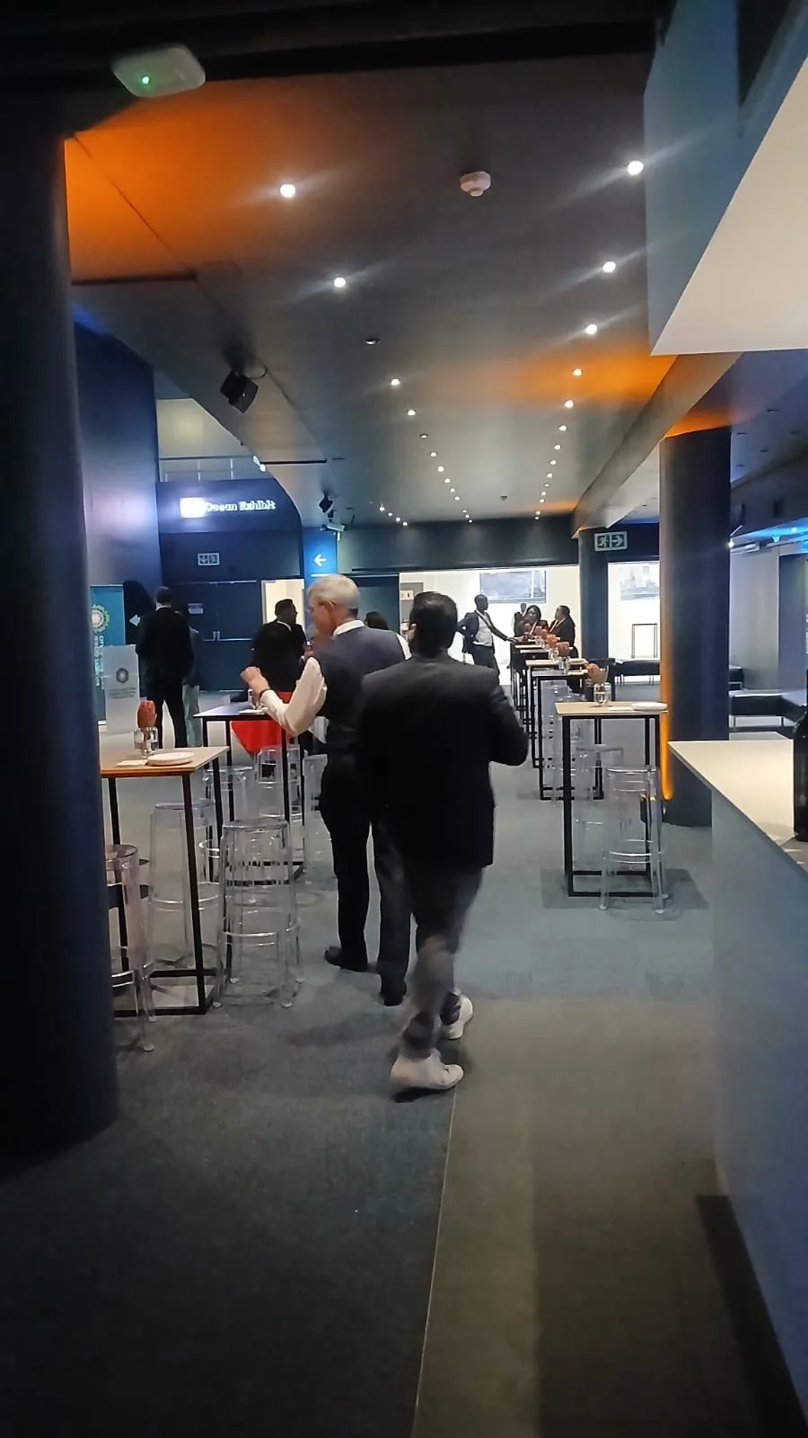 Delegates gathering in the aquarium foyer during the OECD Forum on Tax Administration reception